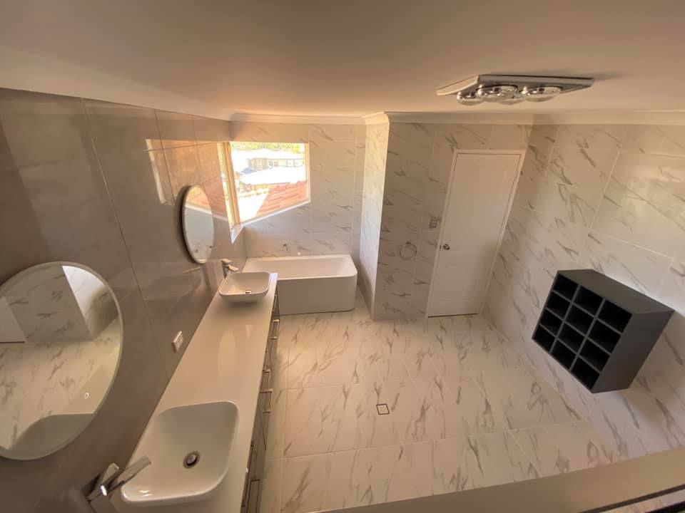 luxurious bathroom with bathtub