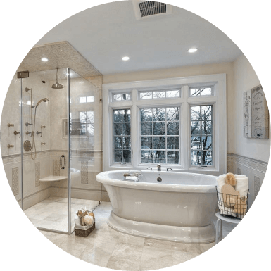 luxury bathroom with glass shower box and bathtub near window