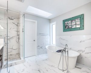 luxurious bathroom with shower cabin and bathtub